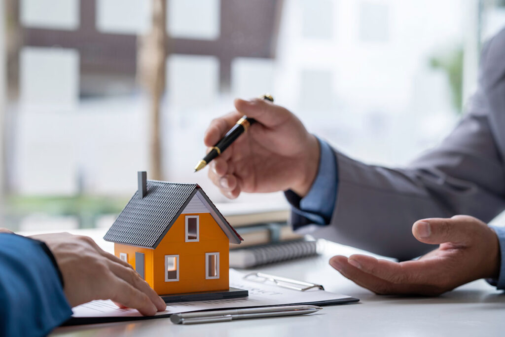 real estate agent working on desk